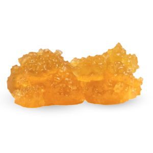 Yellow-orange crystal-like resin, resembling rough nuggets, against a white background.